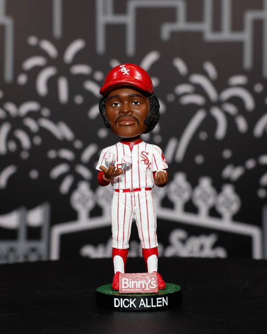 The Dick Allen bobblehead giveaway figure in a red and white pinstripe uniform with his name on the base