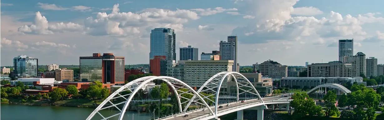 Aerial sunset view of the Little Rock skyline and riverfront